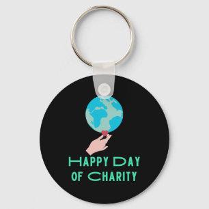 Of International Day Of Charity Sticker Key Ring