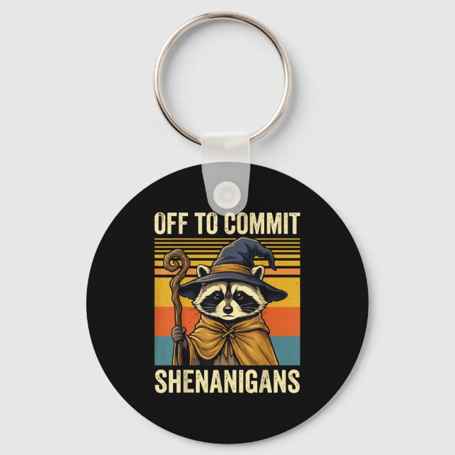 Off to commit shenanigans raccoon  key ring (Front)