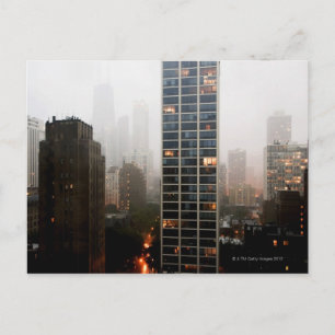 Office towers, condos and Hancock Tower in fog Postcard