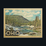 Ohio Vintage Travel Snowy Winter Nature Postcard<br><div class="desc">Ohio snowy winter scene featuring a river flowing through the mountains and a blue sky with puffy clouds. A lovely nature outdoors image for campers,  hikers and adventure seekers.</div>