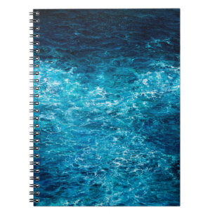  oil painting showing waves in ocean or sea on can notebook