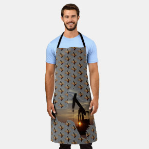 Oil Pump Jack At Sunset Apron