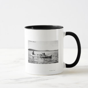 Ojibwa Indians crossing lake in Canoe Photograph Mug