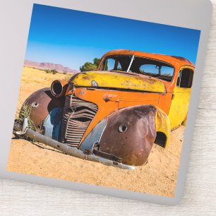 Old and abandoned car in Solitaire, Namibia