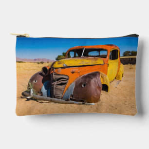 Old and abandoned car in Solitaire, Namibia Accessory Pouch