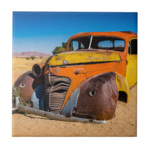 Old and abandoned car in Solitaire, Namibia Tile
