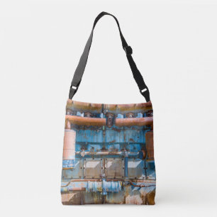 Old and rusty Atlas Imperial diesel engine at Inde Crossbody Bag
