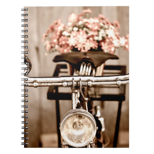 Old bicycle and flowers blur in background process notebook (Front)