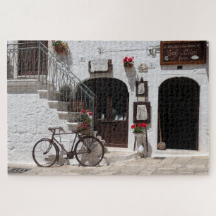 Old bike and storefront in Apulia Jigsaw Puzzle