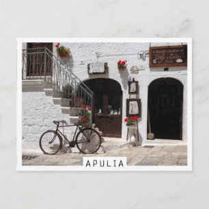 Old bike and storefront in Apulia Postcard