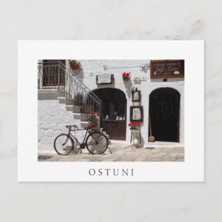 Old bike and storefront in Apulia Postcard