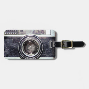 Old black camera luggage tag