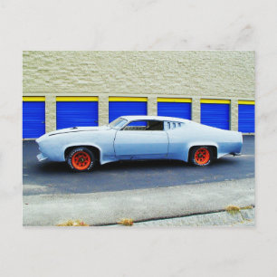 Old blue car in Boston, Massachusetts. Postcard