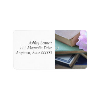 Old books with pink flowers label