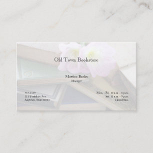 Old books with primroses business card