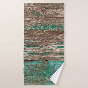 Old brown-blue wooden background with peeling pain bath towel