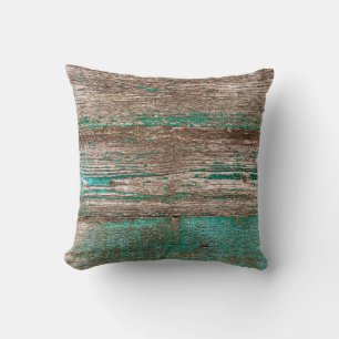Old brown-blue wooden background with peeling pain cushion