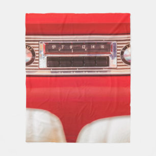 Old car radio inside a red classic American car wi Fleece Blanket