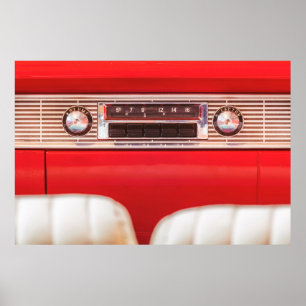Old car radio inside a red classic American car wi Poster