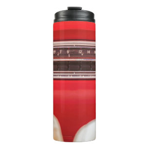 Old car radio inside a red classic American car wi Thermal Tumbler