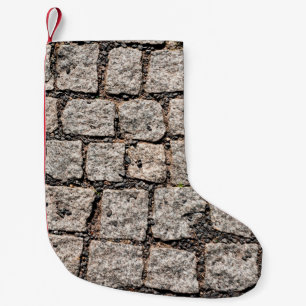 Old cobble stone pattern at the streetabstract,anc small christmas stocking