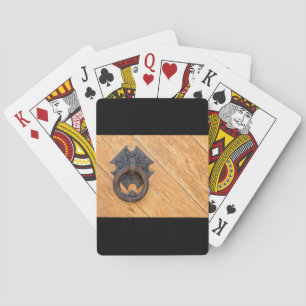 Old door knocker playing cards