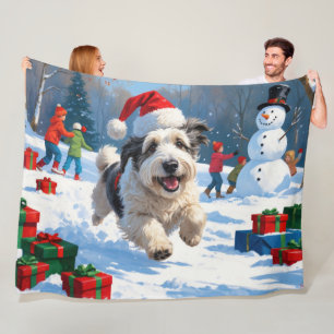 Old English Sheepdog Running in Snow Christmas Hat Fleece Blanket
