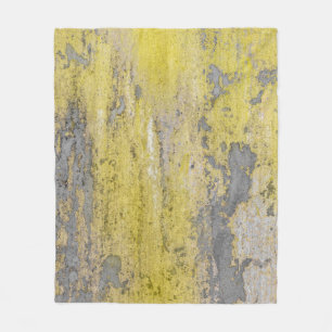 Old grey concrete wall with peeling yellow paint. fleece blanket