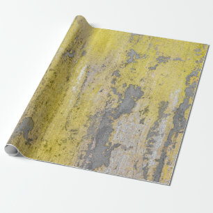 Old grey concrete wall with peeling yellow paint.  wrapping paper
