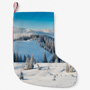 Old grunge wooden texture or background with termi small christmas stocking
