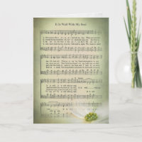 Old hymn sheet music with flower for sympathy