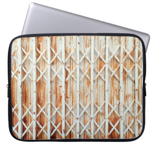 Old iron door panels are rusted. abstract,antique, laptop sleeve