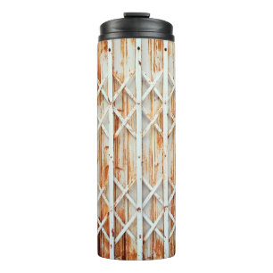 Old iron door panels are rusted. abstract,antique, thermal tumbler