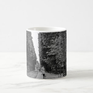 Old lady walking at park in Paris in summer Coffee Mug