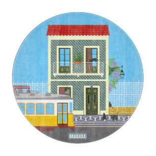 Old Lisbon house with cats  and yellow tram Cutting Board