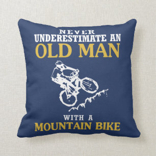 OLD MAN WITH A MOUNTAIN BIKE CUSHION