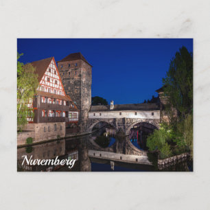 Old mediaeval bridge at night in Nuremberg, German Postcard