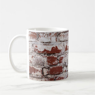 Old painted brick wall with peeling white paintwal coffee mug