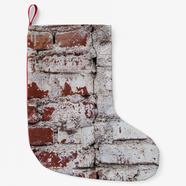 Old painted brick wall with peeling white paintwal small christmas stocking (Front)