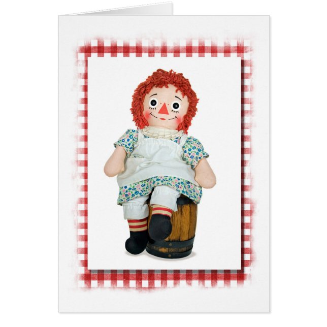 old rag doll on wooden keg (Front)
