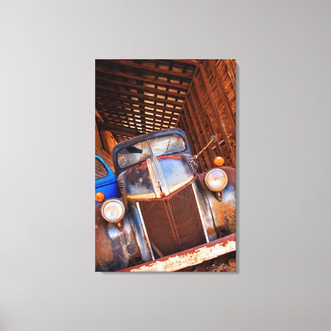 Old rusty truck on a farm canvas print (Front)