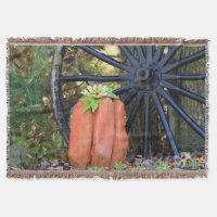 Old Time Wooden Wagon Wheel and Carved Pumpkin
