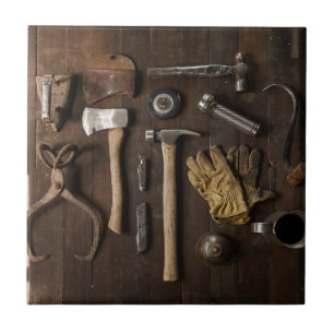 Old Tools on Wood Background Ceramic Title Tile