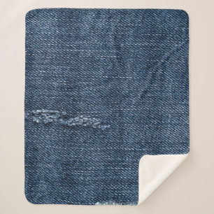 Old torn denim: jeans texture. sherpa blanket