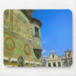 Old town square surrounded by 16th-century mouse mat