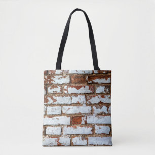 Old vintage brick wall with sprinkled white plaste tote bag