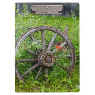 Old wagon wheel in historic old gold town 3 clipboard