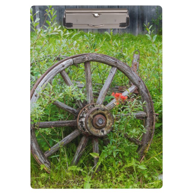 Old wagon wheel in historic old gold town 3 clipboard (Front)
