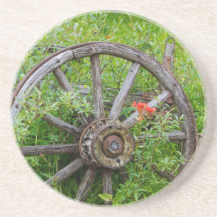 Old wagon wheel in historic old gold town 3 coaster