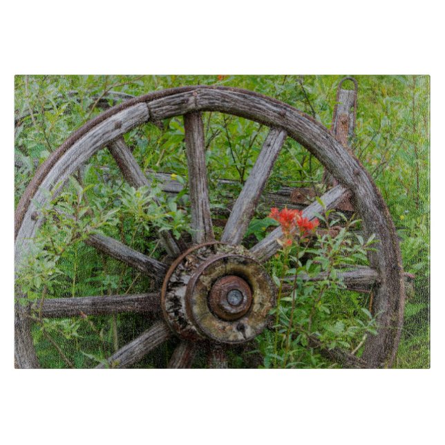Old wagon wheel in historic old gold town 3 cutting board (Front)